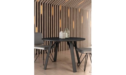 Mesa de comedor con patas de madera y sobre biselado 120cm de diametro y 22cm de espesor en Mallorca.