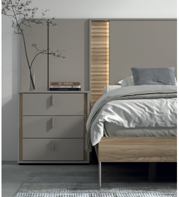 Dormitorio contemporáneo con cabecero retroiluminado y líneas arquitectónicas